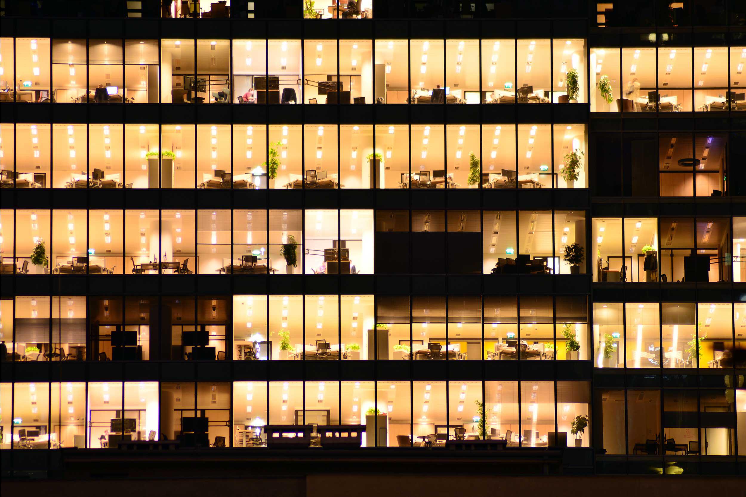 Picture of windows in a building with lights on